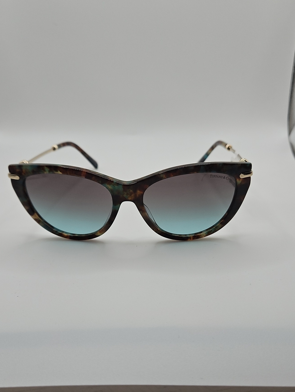Tiffany & Co. Women's Tortoiseshell Cat Eye Sunglasses with Blue Gradient Lenses